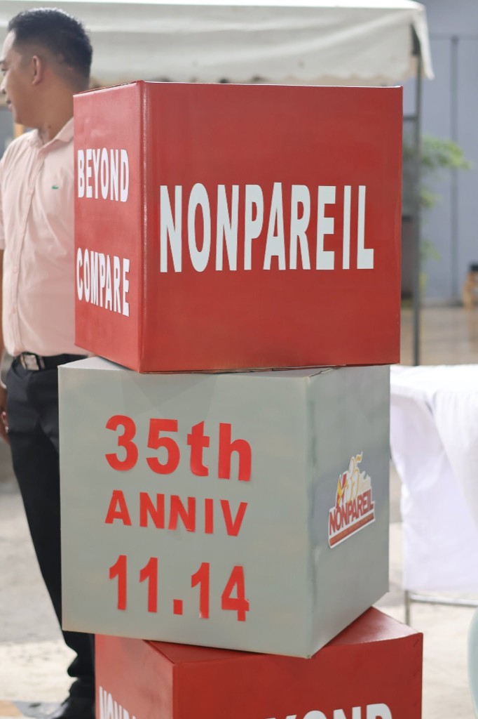 Stacked decorative cubes with NONPAREIL, BEYOND COMPARE, and 35th ANNIV 11.14 branding at Nonpareil Business Park